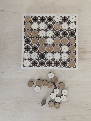 Top view of a game won by the darker tokens